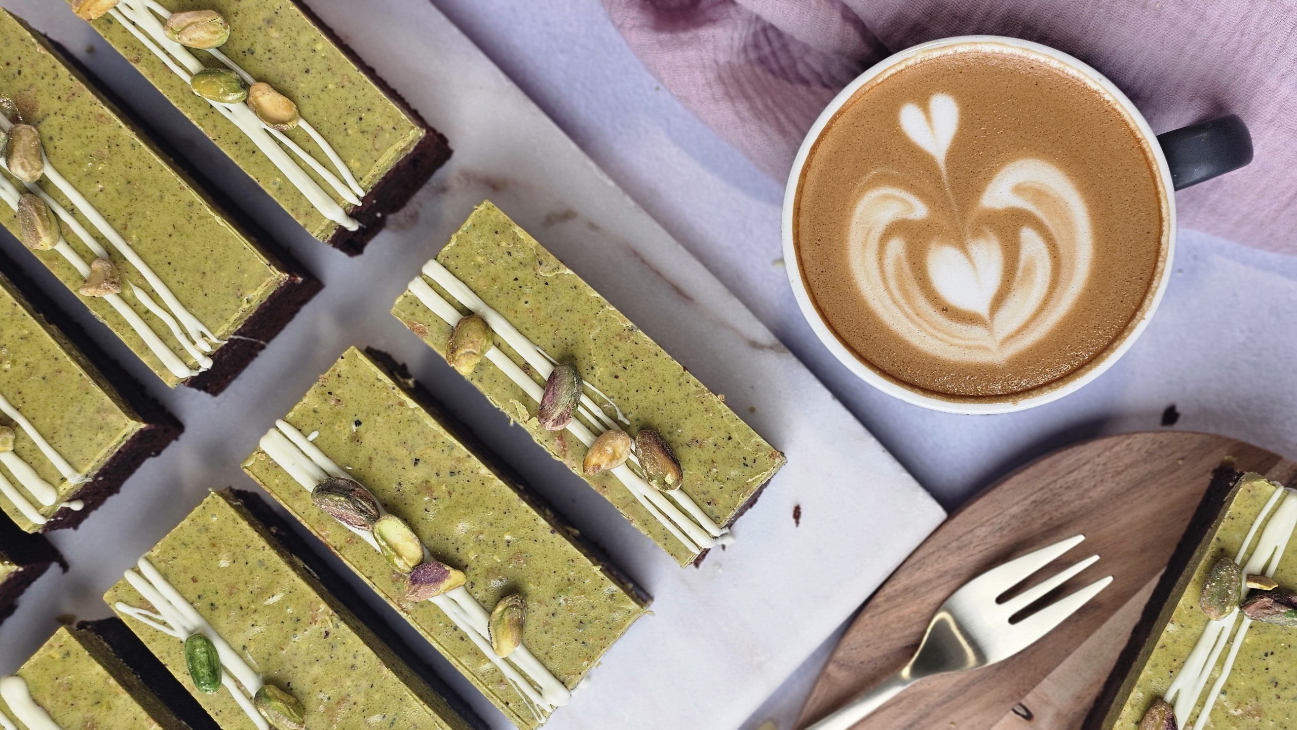 A close up of coffee and cake