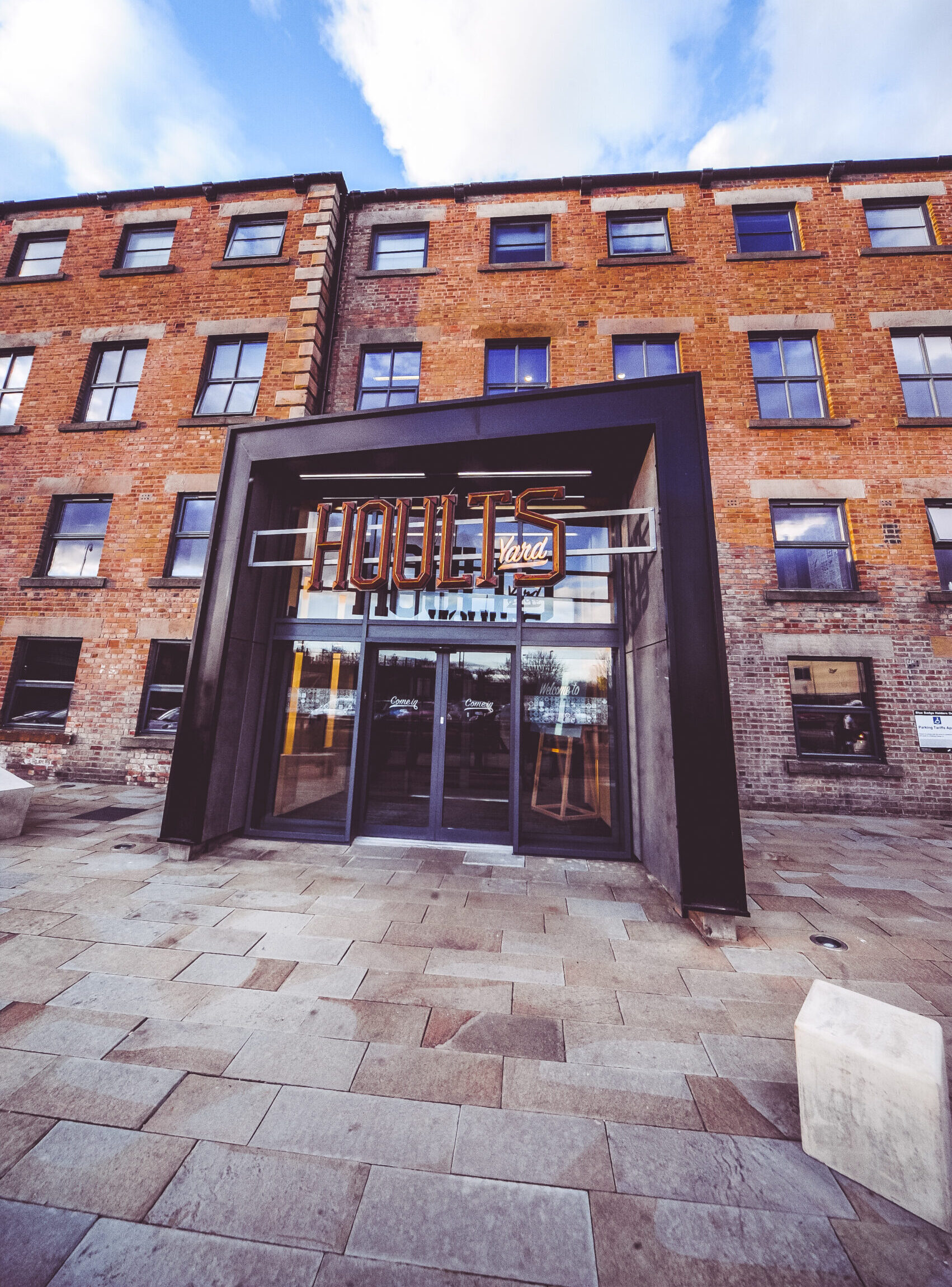 A photograph of the entrance to Hoults Yard